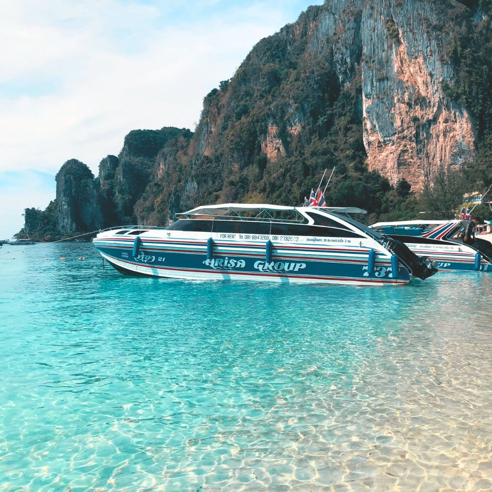 Phi Phi Island Speedboat one day half day boat tour from Phi Phi Arisa Boat beach snorkel