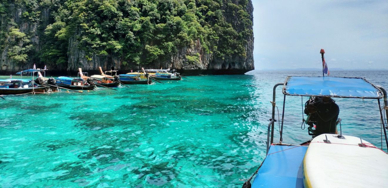 longtail boat trip to phi phi island clear water swiming