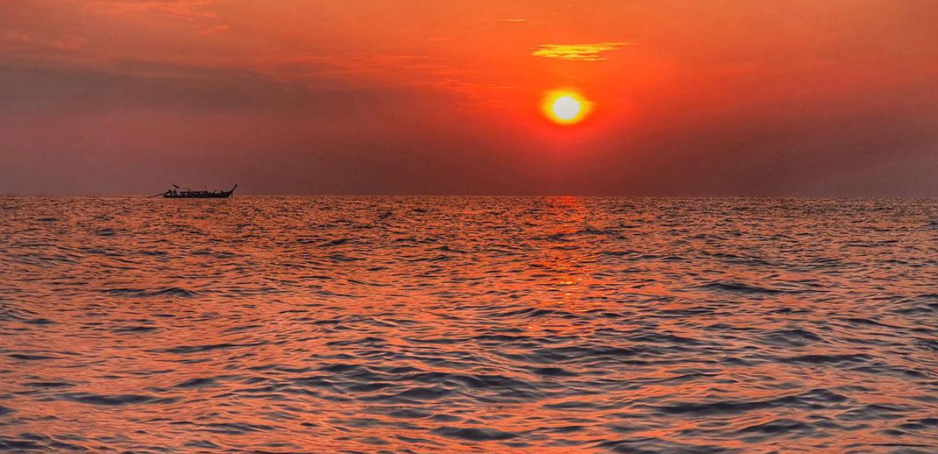 sunset andaman sea red sky phi phi island thialnad boat tour