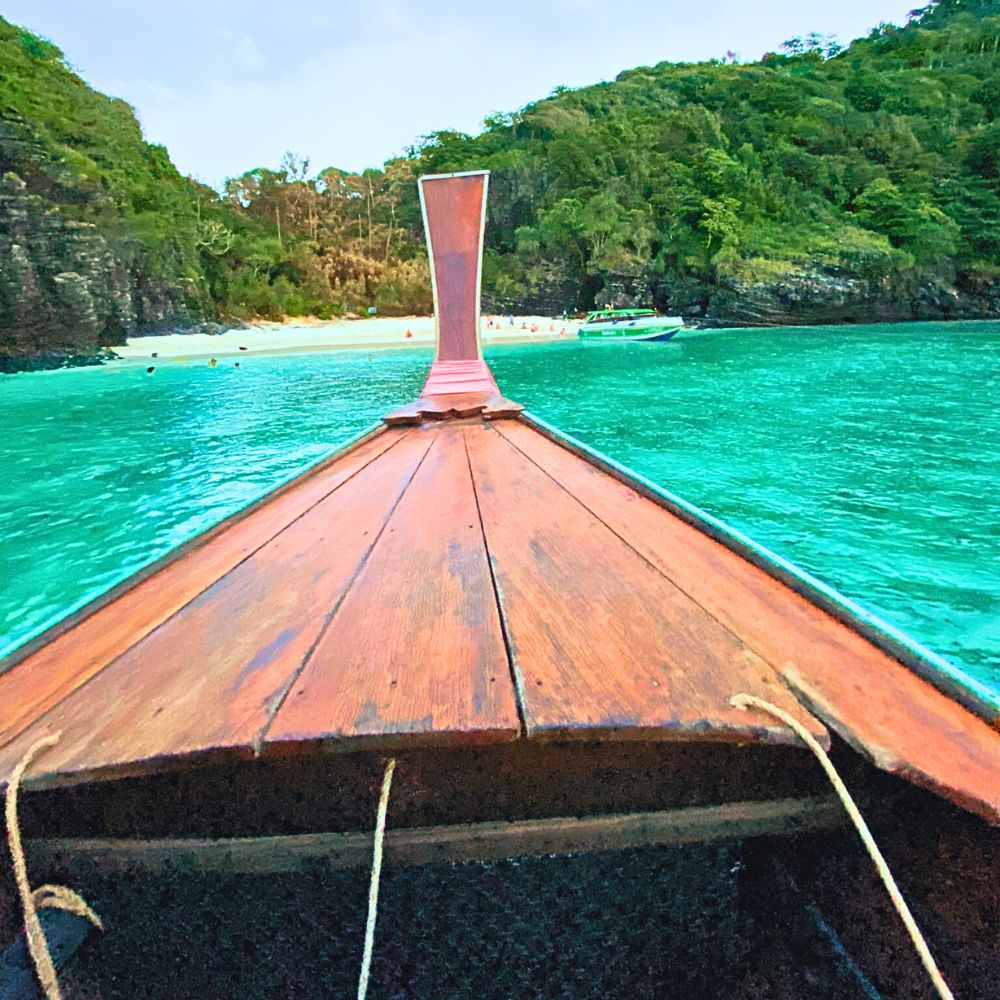 longtail boat phi phi island nui bay beach phi phi don swimming tour