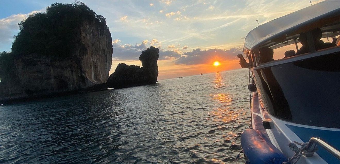 speedboat sunset tour phi phi island camel rock nui beach bay