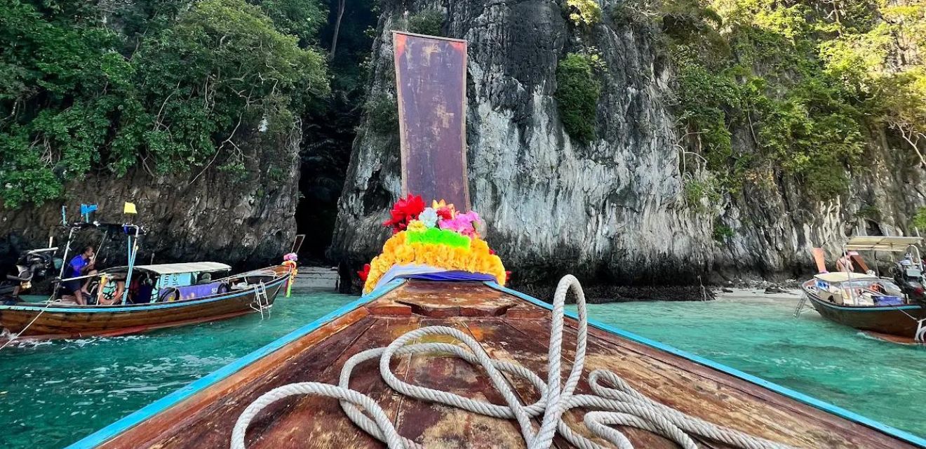 thai longtail boat at saam haad monkey beach koh phi phi