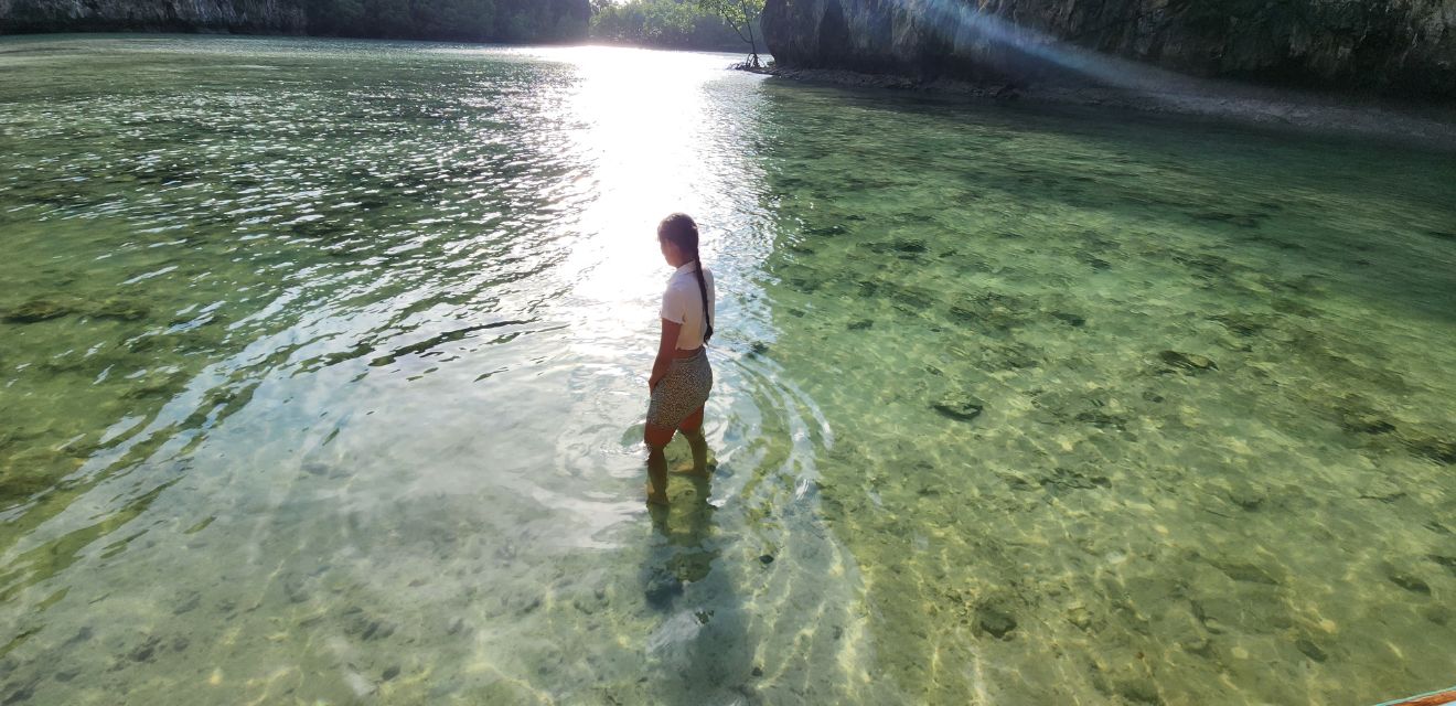 hong island lagoon shallow water woman tourist