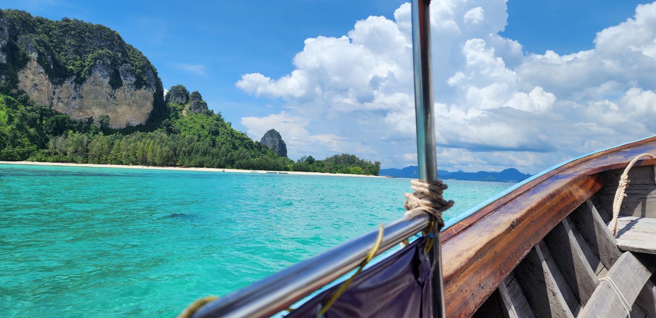 photo from thailand longtail boat with blue sea on four island boat tour