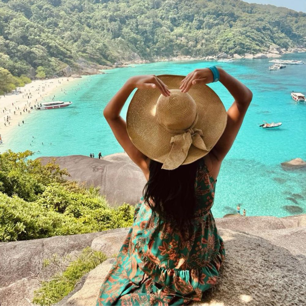 similan island donald duck rock viewpoint woman pose tour speedboat beach