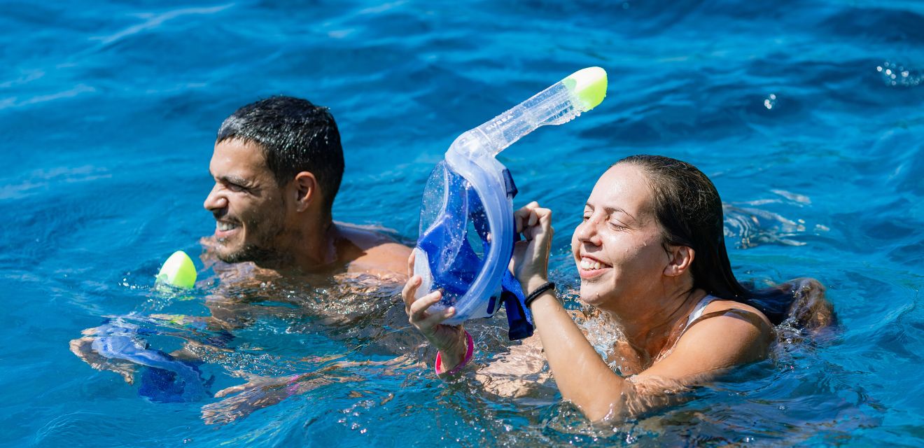 snorkel swim in sea at similan islands