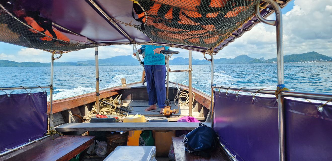 thai longtail boat inside photo krabi islands captain