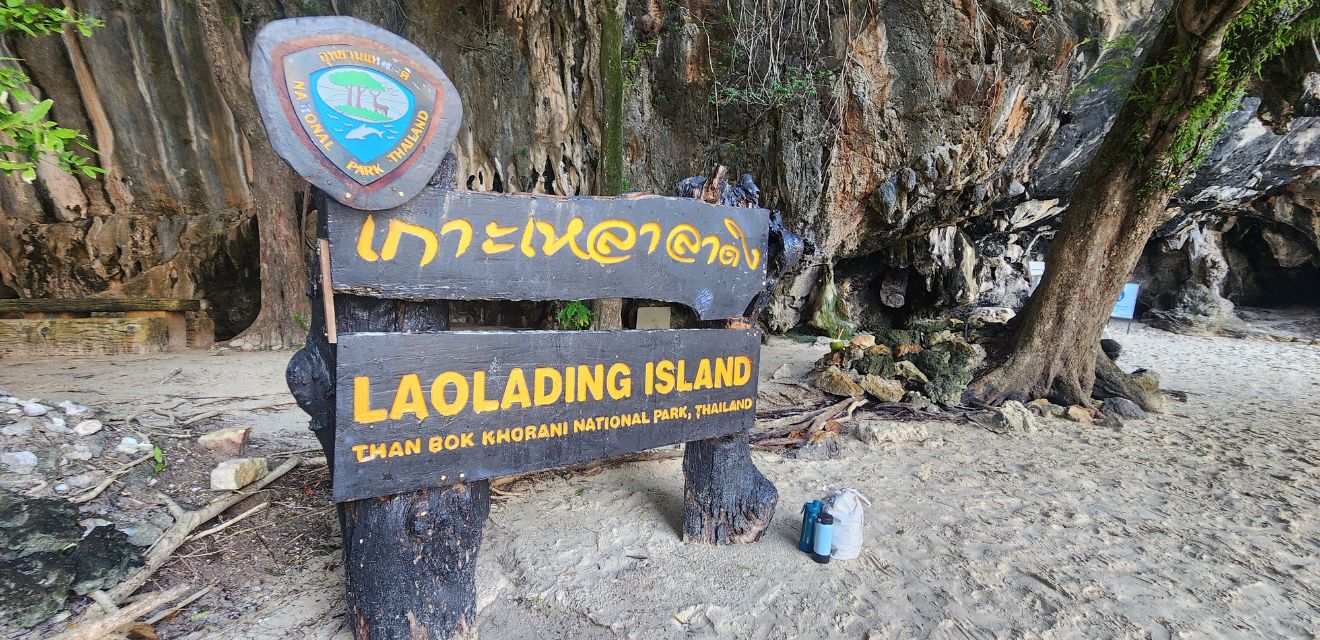 thailand national park sign post koh lao lading island sign on beach