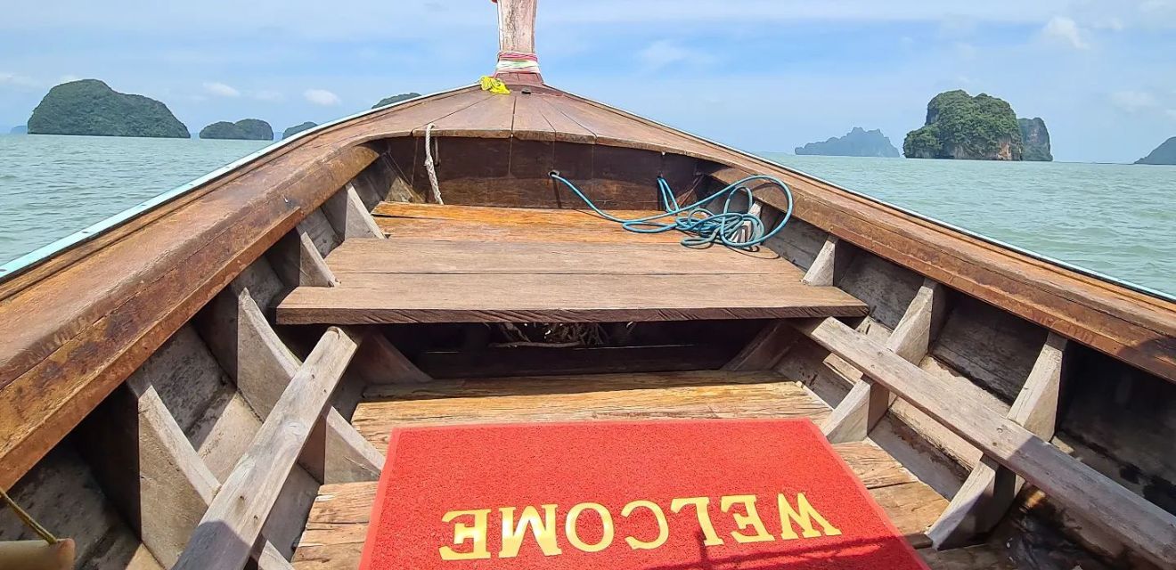 welcome mat phi phi long boat tour wood boat