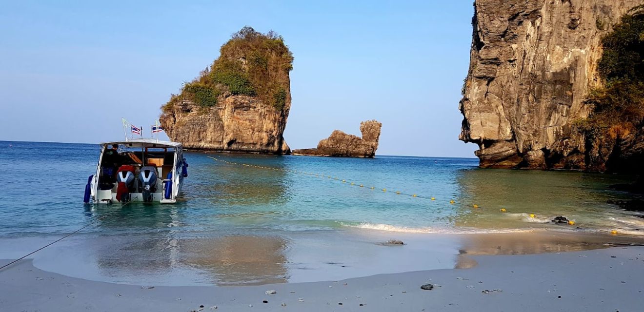 speedboat phi phi isalnd on the beach at nui bay camel rock koh phi phi tour form krabi